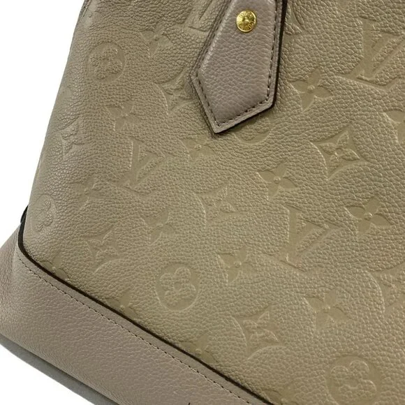 LOUIS VUITTON NeoAlma Tourterelle Monogram Empreinte Handbag - Picture 4 of 15